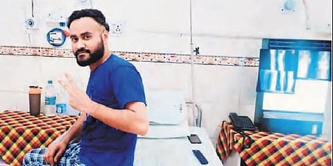 Harjot Singh flashes the victory sign before leaving the hospital | EXPRESS