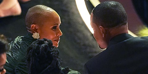 Jada Pinkett Smith, left, and Will Smith appear in the audience at the Oscars on Sunday, March 27, 2022, at the Dolby Theatre in Los Angeles. (Photo | AP)