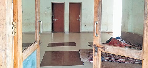 Damaged doors of an IIIT-Nuzvid hostel building. ( Photo | EPS)