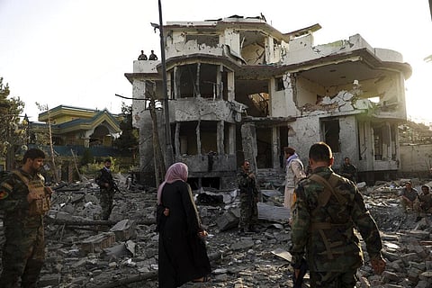 Afghan security personnel inspect a damaged building in the aftermath of an attack in Kabul, Afghanistan, Wednesday, Aug. 4, 2021(Photo |AP)