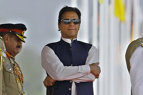 Pakistan's Prime Minister Imran Khan attends a military parade to mark Pakistan National Day, in Islamabad, Pakistan. (Photo | AP)