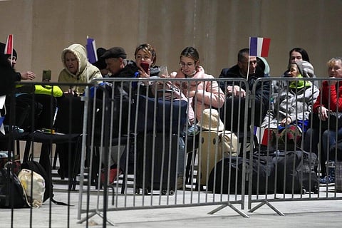 Ukrainians wait to travel to other European countries as they sit at a refugee center in Nadarzyn, near Warsaw, Poland. (Photo | AP)