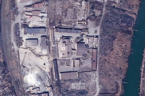 In this satellite photo from Planet Labs PBC, an International Committee of the Red Cross warehouse is seen with apparent damage from shelling in Mariupol. (Photo | AP)