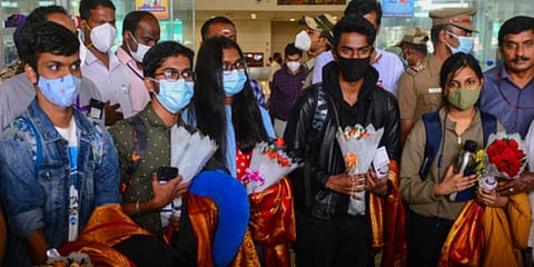 Evacuated students landed at Chennai aiport on Sunday morning and were welcomed with bouquets. (Photo | Debadatta Mallick, EPS)