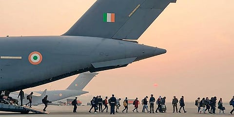 Indian nationals, evacuated from war-torn Ukraine, on their arrival at the Hindon airbase, in Ghaziabad.(Photo | PTI)