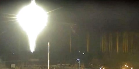 Zaporizhzhia nuclear power plant shows bright flaring object landing in grounds of the nuclear plant in Enerhodar. (Photo | AP)