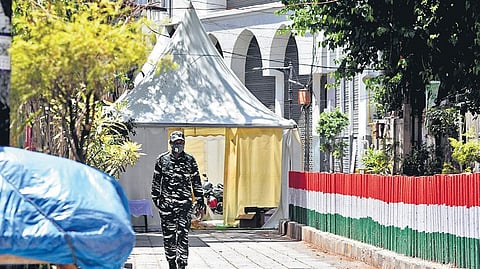 A CRPF personnel patrols outside the cordoned off area at Tablighi Jamaat’s Nizamuddin Markaz (File Photo | Parveen negi)