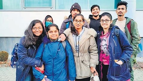 Six medicos from Andhra Pradesh pose for a photo at Delhi airport on Friday I Express