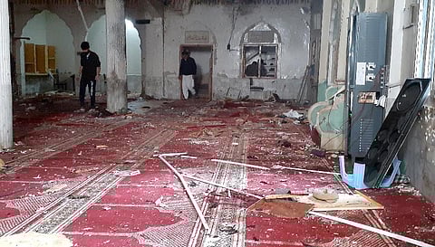 A powerful bomb exploded inside a Shiite Muslim mosque in Pakistan's northwestern city of Peshawar killing more than 30 worshippers and wounding dozens more. (Photo | AP)
