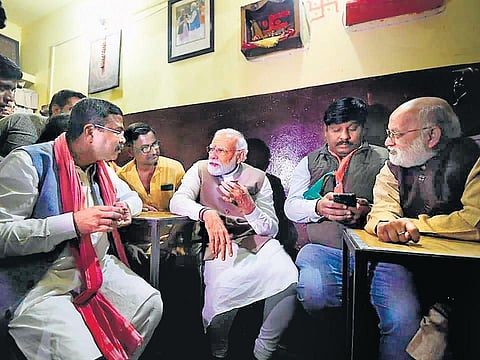 PM Narendra Modi relishes tea at the famous Pappu Tea Shop in Varanasi | Express