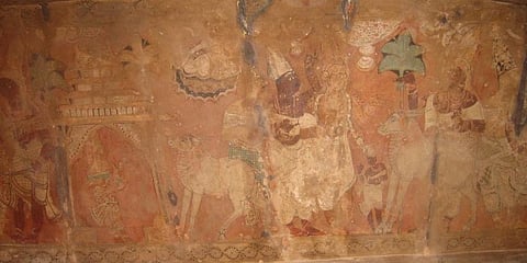 Manu Neeti Chola mural in the Natya mandapa of the Virabhadra Temple in Lepakshi, Andhra Pradesh: The king hears the cow that asks for justice.