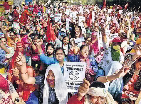 Anganwadi workers protest seeking better pay and working conditions (File photo| Express)