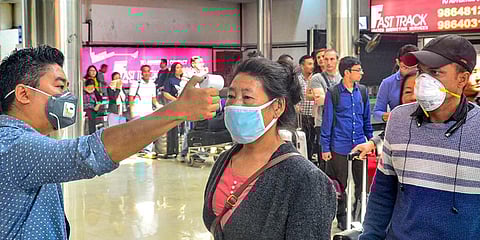 Passengers undergo a thermal screening test at Dimapur airport in Nagaland. (Photo| PTI)