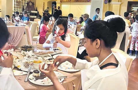 Children busy decorating eggs at The Easter Workshop conducted by The Imperial. ( File Photo)