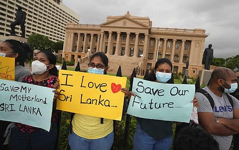Sri Lankans protest outside the president's office in Colombo, Sri Lanka, Saturday, April 9, 2022. (Photo | AP)
