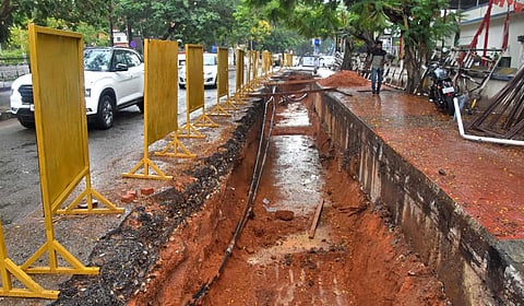 The roadside found dug up near KSEB office at Vellayambalam-Vazhuthacaud stretch for laying utility cables as part of smart road development under Smart City Mission scheme. (Photo | B P Deepu, EPS)