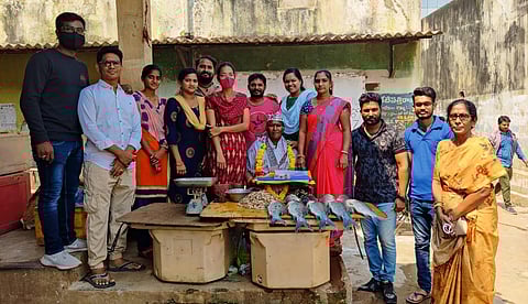 Mana Peddapuram members felicitate fisherwomen on Women's Day. (Photo| EPS)