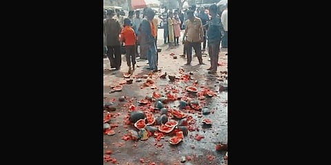 Watermelon scattered on the road near Nuggikeri temple in Dharwad.