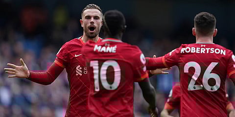 Liverpool's Sadio Mane, front, celebrates with teammates after scoring his side's second goal during the EPL match against Manchester City, at the Etihad Stadium in Manchester. (Photo | AP)