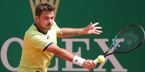 Stanislas Wawrinka returns the ball to Alexander Bublik during their Monte-Carlo ATP Masters Series tournament tennis match in Monaco. (Photo | AFP)