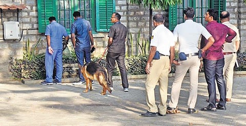 Bomb disposal personnel conduct a search operation at the school premises| express