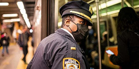 NYPD officers patrol platforms and train cars at the 36th Street subway station where a shooting attack occurred in New York. (Photo| AP)