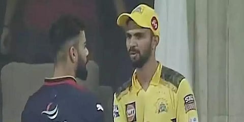 CSK opener Ruturaj Gaikwad (R) interacts with RCB batter Virat Kohli. (Photo | Twitter)