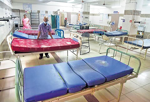 Staff cleaning beds at Covid-19 wards at RGGGH on Tuesday after the lone patient got discharged on Monday | R Satish Babu