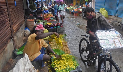 A traders selling kanikonna at Chalai market in Thiruvananthapuram on Wednesday. (Photo | B P Deepu, EPS)
