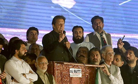 Former Pakistani Prime Minister Imran Khan, center, addresses an anti government rally, in Peshawar, Pakistan, early Thursday, April 14, 2022. (Photo | AP)