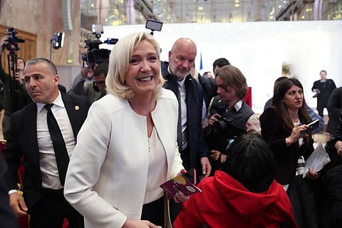 French far-right leader Marine Le Pen leaves after a press conference in Paris, Wednesday, April 13, 2022. (Photo | AP)