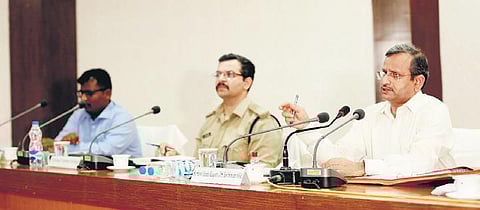 CS Mahapatra chairing the review meeting in Malkangiri on Thursday | Express