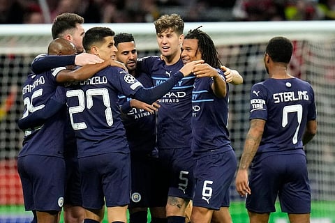 Manchester City's players celebrate a win. ( Photo | AP)