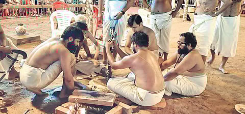 Priests preparing the yanja fire amid chanting of mantras for Maha Kubera Yagam in Palakkad on Sunday | Express