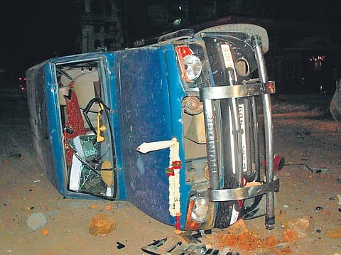 A damaged police vehicle after riots broke out in Old Hubballi late on Saturday night | Express