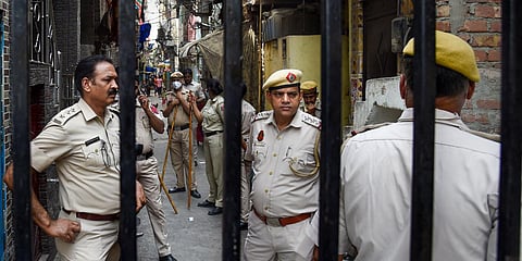 Tight security after clashes broke out between two communities during a Hanuman Jayanti procession on Saturday, at Jahangirpuri in New Delhi. (Photo| PTI)