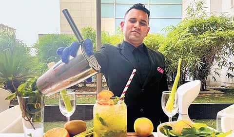 Shaman Pathania making the Aam Panna Mojito;