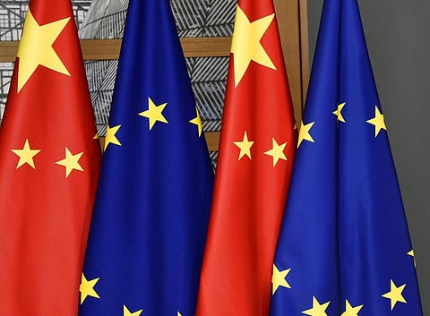 EU and Chinese flags are seen at the Europa building in Brussels, Tuesday, Dec. 17, 2019.(Photo |AP)