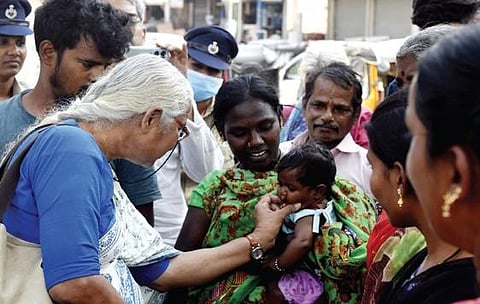 Social activist Medha Patkar meets some of the 51 families who were displaced due to the demolition of their dwellings at Moosarambagh, in Hyderabad . ( Photo | EPS)