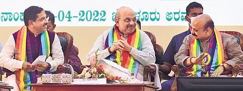 Union Ministers Pralhad Joshi and Amit Shah and CM Basavaraj Bommai in conversation at the Cooperative Conference in Bengaluru | ashishkrishna hp