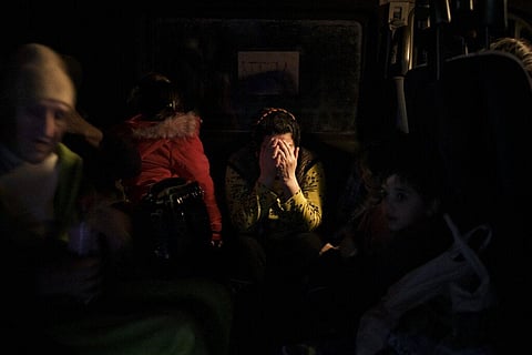 A woman reacts as she arrives from Mariupol to a refugee center in Zaporizhia, Ukraine, Friday, April 1, 2022. (Photo |AP)