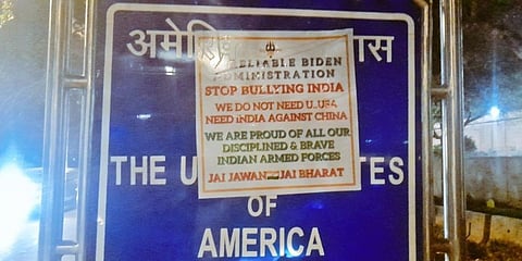 The anti-America poster outside US Embassy in Delhi. (Photo| IANS)