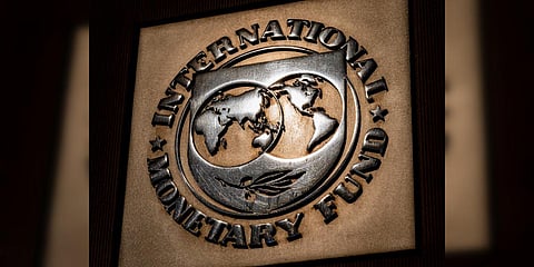 The logo of the International Monetary Fund is visible on their building in Washington DC. (Photo| AP)