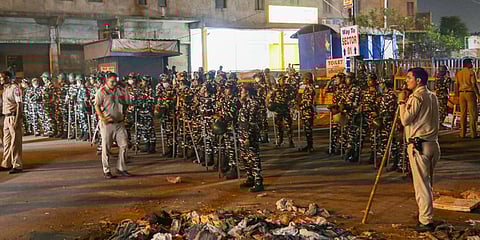 Paramilitary Force and police personnel at the violence-hit Jahangirpuri area, after a joint anti-encroachment drive of NDMC, PWD, local bodies and the police, in the area, in New Delhi. (Photo| PTI)