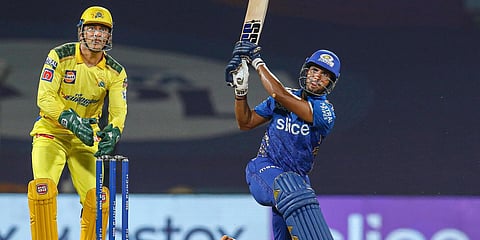 Mumbai Indians' Tilak Varma plays a shot during an IPL 2022 match against Chennai Super Kings, at the DY Patil Stadium in Navi Mumbai. (Photo| PTI)