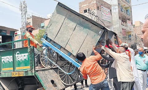 Public Works Department and Delhi Police in violence-hit Jahangirpuri on Wednesday | parveen negi, ankita upadhyay