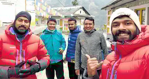 Ashwin (extreme left) and Vivek (extreme right) with Sherpa guides