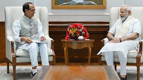 PM Narendra Modi (R) with Madhya Pradesh CM Shivraj Singh Chouhan, during their meeting in New Delhi. (File Photo | PTI)