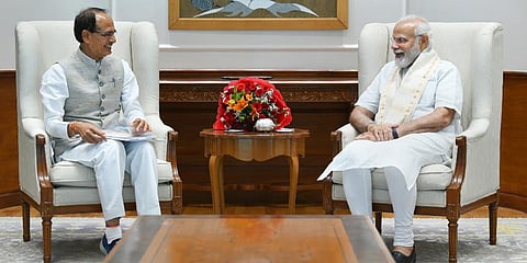 PM Narendra Modi (R) with Madhya Pradesh CM Shivraj Singh Chouhan, during their meeting in New Delhi. (Photo | PTI)