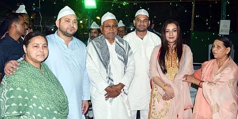 Bihar chief minister Nitish Kumar with leader of opposition Tejashwi Prasad Yadav and other members of family at an Iftar party organised by RJD in Patna. (Photo| EPS)